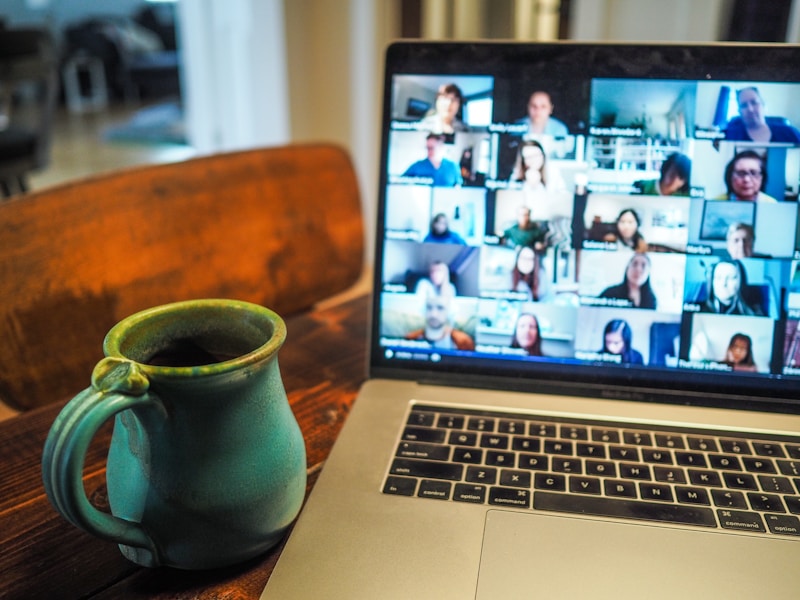 Person working remotely on laptop feeling isolated from team