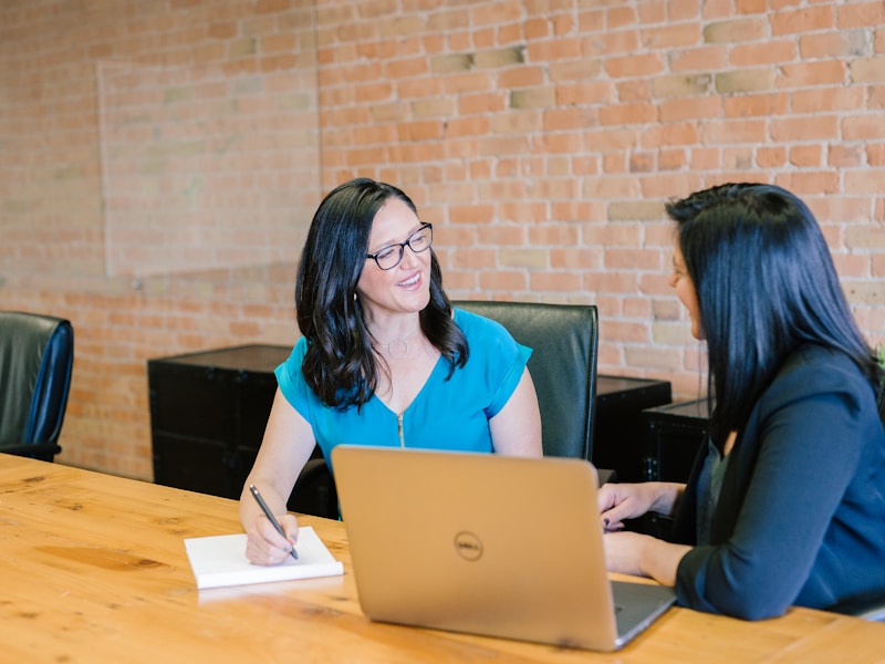 Stressed employee in a one-on-one review meeting